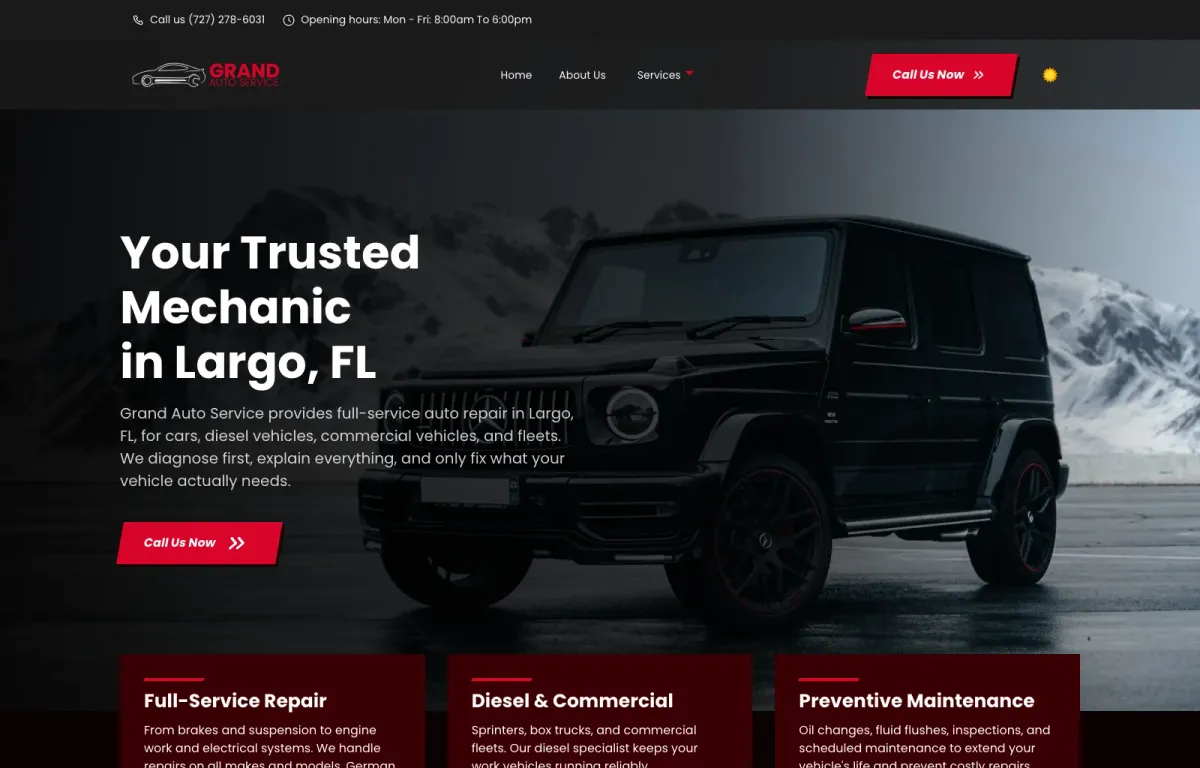 Grand Auto Service desktop website on a MacBook
